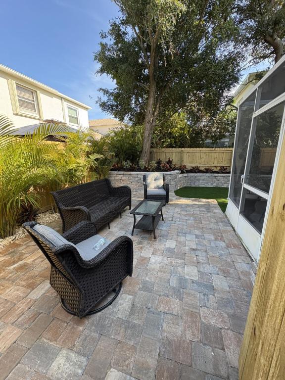 Indian Harbour Beach landscape design after patio and planting installation
